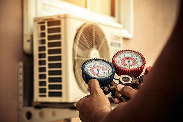 Professional Air Conditioning Service technician working in York, ME